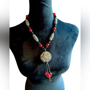 Handmade African Clay & Glass Bead Necklace
Made in the Ivory Coast